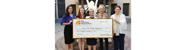 Large check donated to the Fresh Start Womens Foundation